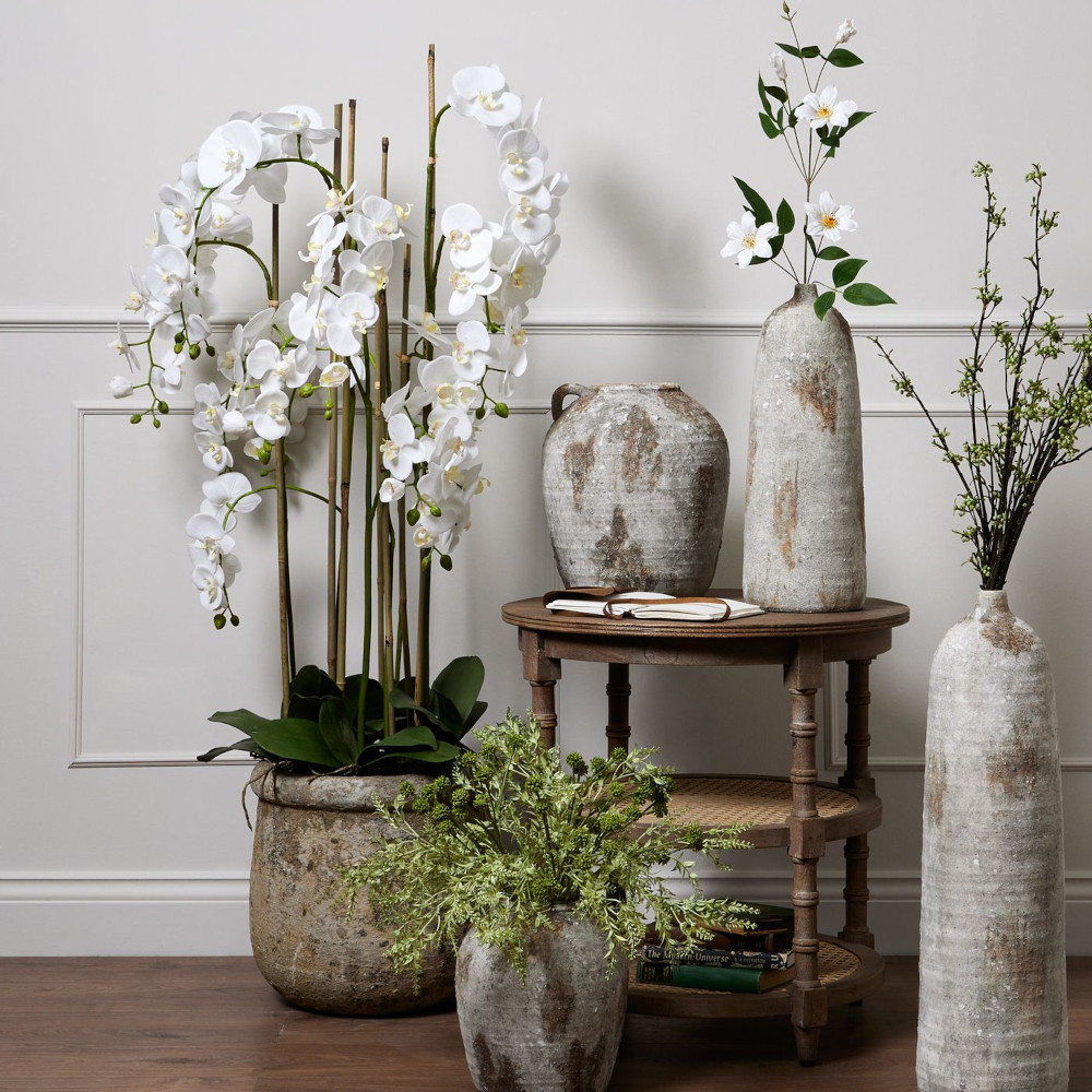 Large White Orchid In Antique Stone Pot